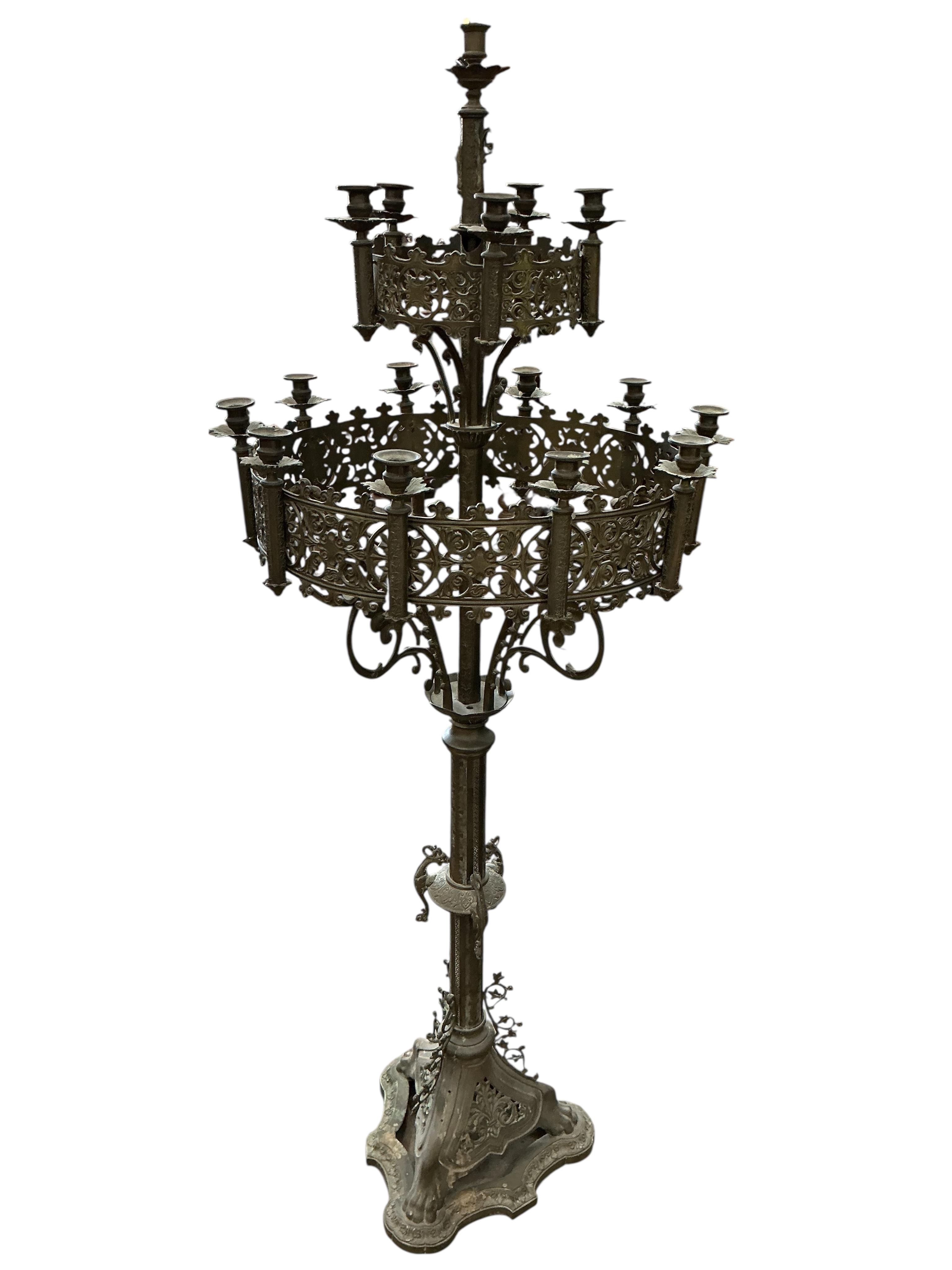 A late 19th century French pierced brass ecclesiastical candlestand, height 152cm
